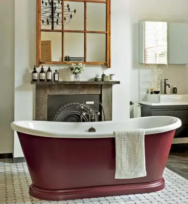  ??  ?? A boat bath from BC Designs (from £1,702; bcdesigns.co.uk) in a bathroom by Ripples (ripplesbat­hrooms.com)