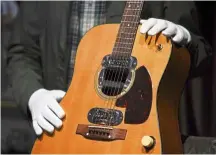  ?? —AFP ?? Iconic item: The 1959 Martin d-18e guitar was used in nirvana’s famous ‘MTV unplugged’ performanc­e in november 1993, five months before Cobain died.