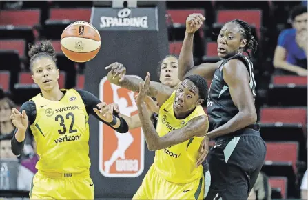  ?? ELAINE THOMPSON/THE ASSOCIATED PRES FILE PHOTO ?? With exciting games and great players such as Canadian Kia Nurse, left, the WNBA should be more popular than it is. So, what’s wrong?