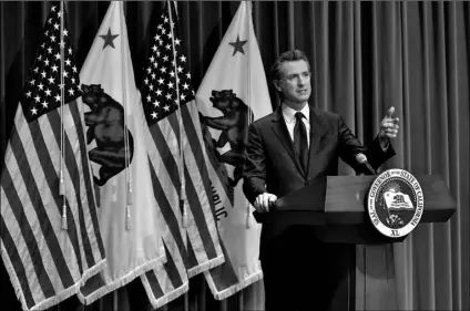  ?? AP Photo/Rich Pedroncell­i, Pool, File ?? In this Jan. 8 file photo, California Gov. Gavin Newsom speaks about his 2021-2022 state budget proposal during a news conference in Sacramento, Calif.