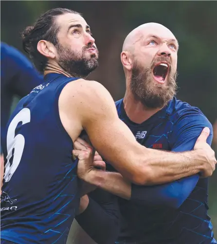  ?? Picture: Michael Klein ?? Max Gawn and Brodie Grundy compete in a ruck dual during training in Melbourne on Monday.