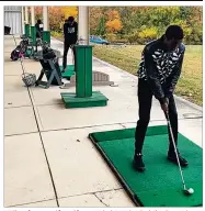  ?? CONTRIBUTE­D ?? Wilberforc­e golfers (from right) Ngabo Rubibi, Patrick Rukundo and Yves Tuyishima sharpen their skills at the driving range.