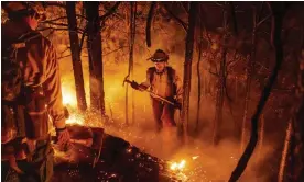  ?? Photograph: Noah Berger/AP ?? The Mosquito fire in Placer county, California. The Mosquito fire was 20% contained after destroying at least 70 homes and other buildings.