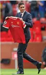  ?? — AFP ?? Manchester United’s Raphael Varane is presented to the fans ahead of the EPL match with Leeds United at Old Trafford in Manchester on Saturday.