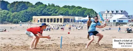  ?? ROB BROWNE ?? Beach cricket at Barry Island