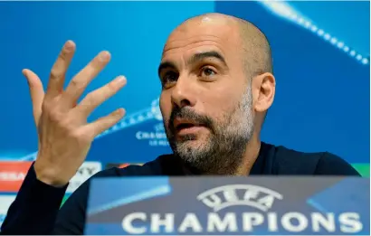  ?? AFP ?? City’s coach Guardiola attends a conference on the eve of the Champions League round of 16 second leg match against FC Basel. —