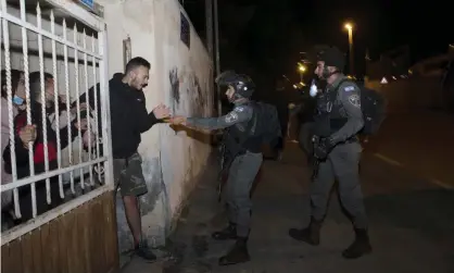  ??  ?? Israeli border police in Sheikh Jarrah, East Jerusalem, on 12 May. Several Palestinia­n families in the area face imminent eviction. Photograph: Maya Alleruzzo/AP