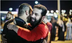  ?? Photograph: Anadolu/Getty Images ?? Families gathered in the southern Bahraini city of Hamad to welcome their freed relatives on 8 April.