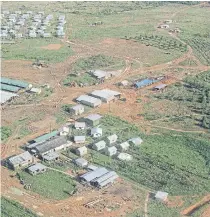  ?? THE ASSOCIATED PRESS FILE PHOTO ?? This November 1978 photo shows the Peoples Temple compound after the bodies were removed, in Jonestown, Guyana.