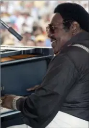  ?? AP FILE PHOTO ?? Fats Domino performs on the opening day of the 34th annual New Orleans Jazz & Heritage Festival in New Orleans on April 24, 2003.