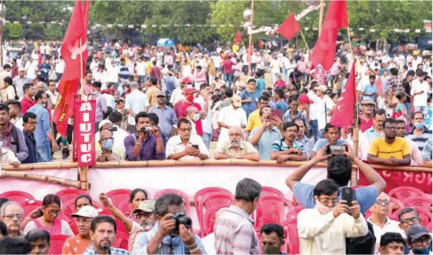  ?? Associated Press ?? ↑ Supporters of left wing trade unions gather during a rally on May Day in Kolkata, West Bengal, on Sunday.