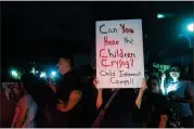  ?? AMANDA VOISARD / AMERICAN-STATESMAN ?? Groups make their way through McAllen, Texas, during a vigil and prayer walk Wednesday. Participan­ts walked in honor of immigrant families and children who have been separated at the border.