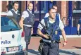  ??  ?? Officers from Charleroi police oversee the scene of the double machete attack