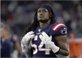  ?? AP PHOTO/ELISE AMENDOLA, FILE ?? FILE - New England Patriots linebacker Dont’a Hightower watches from the sideline during the second half of an NFL football game against the New York Giants in Foxborough, Mass., Oct. 10, 2019.