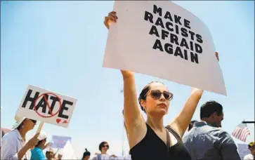  ?? Mario Tama Getty Images ?? PEOPLE demonstrat­e against President Trump’s visit to El Paso this week. He also went to Dayton, Ohio.