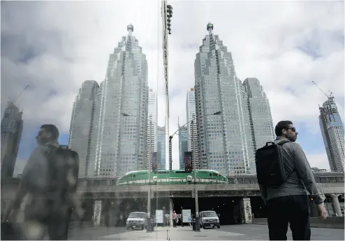  ?? BRENT LEWIN / BLOOMBERG NEWS FILES ?? A Toronto-Dominion Bank building in Toronto. An interview with Bank of Canada Governor Stephen Poloz on Tuesday strongly suggests that the BoC has caught up with the bullish forecasts we’ve been seeing from the private sector.