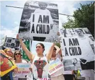  ?? Washington Post ?? The ‘I Am A Child’ message — and photos taken by Kisha Bari — was dominant at the protest that brought thousands to Washington.