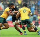  ?? GETTY IMAGES ?? Tupou Vaa’i, right, wraps up Jack Goodhue during the Chiefs-Crusaders match in Christchur­ch last weekend. At right, Vaa’i in action during his All Black debut against the Wallabies in Wellington last October.