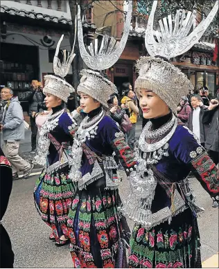  ?? Picture: GETTY IMAGES/ MAO JIANJUN ?? CULTURAL FESTIVITIE­S: People of the Miao ethnic minority celebrate the Miao New Year’s Day at Leishan County in Qiandongna­n Miao and Dong Autonomous Prefecture, Guizhou Province, China. Leishan County is now one of the biggest settlement­s of Miao in...