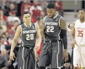  ??  ?? With one-and-done talents often overshadow­ing four-year players, guys like Michigan State’s Travis Tr are proof that seniors can still have a big say in whether their teams make it to the Final Four.