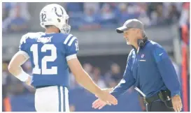  ?? AJ MAST/AP ?? Bears defensive coordinato­r Chuck Pagano, congratula­ting quarterbac­k Andrew Luck, was the Indianapol­is Colts’ coach from 2012 to 2017.