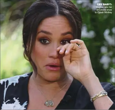  ??  ?? cry baby?: Meghan lets her emotions show to Oprah Winfrey