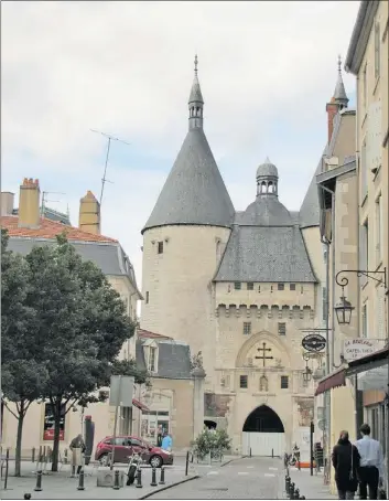  ?? PHOTOS: BARBARA SELWITZ/ FOR THE PROVINCE ?? Nancy’s older old town with a portion of its medieval wall and gate.