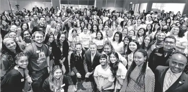  ?? COURTESY PHOTO ?? Governor Newsom poses with the first class of College Corps Fellows during their swearing-in ceremony on October 7, 2022.