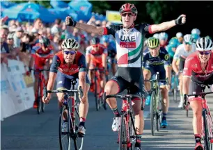  ?? Supplied photo ?? UAE Team Emirates’ rider Sacha Modolo wins the sprint stage. —