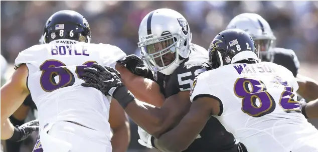  ?? PHOTO BY EZRA SHAW — GETTY IMAGES ?? Oakland’s Khalil Mack, one of the NFL’s best defenders, will have to learn a new defensive system this season.