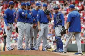  ?? JOHN MINCHILLO — THE ASSOCIATED PRESS ?? Is it finally the year for the ever-cursed Chicago Cubs? An early playoff exit would likely be the most disappoint­ing playoff performanc­e for a team with a long history of disappoint­ment.