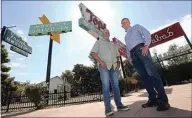  ?? ALEX HORVATH / THE CALIFORNIA­N ?? Kern County Museum Executive Director Mike McCoy and Bakersfiel­d homebuilde­r and businessma­n Bryan Batey stand in the center of the museum’s Neon Plaza on Friday.