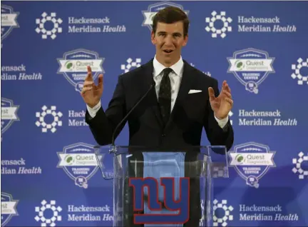  ?? ADAM HUNGER - THE ASSOCIATED PRESS ?? New York Giants quarterbac­k Eli Manning announces his retirement on Friday, Jan. 24, 2020, in East Rutherford, N.J.