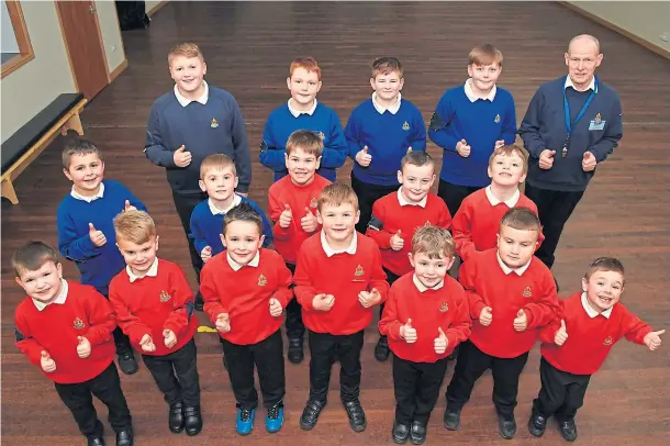  ??  ?? THUMBS UP: Sandhaven Boys’ Brigade would love a minibus to extend their outings, which have already taken them up Bennachie and in to Codona’s in Aberdeen
