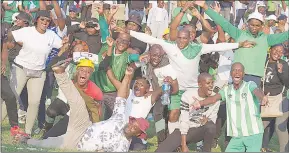  ?? ?? Green Mamba supporters in a jovial mood after their team clinched the league title.