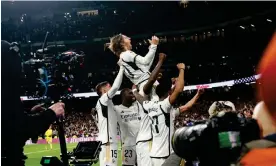  ?? Sevilla. Photograph: Javier Lizón/EPA ?? Real Madrid's Luka Modric is held aloft by his teammates after scoring the late winner against