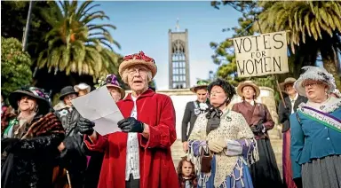  ?? LUZ ZUNIGA/STUFF ?? Penny Molnar plays the part of one of the speakers who in 1893 demanded women’s right to vote, at Nelson Cathedral steps.