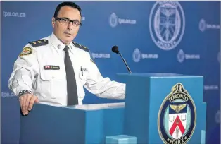  ?? CP PHOTO ?? Insp. Dominic Sinopoli, unit commander of sex crimes, speaks about the alleged assaults and sexual assaults involving students at St. Michael’s College School during a press conference at police headquarte­rs in Toronto on Monday.