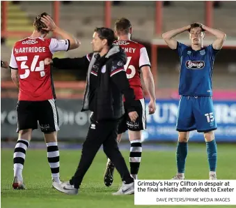  ?? DAVE PETERS/PRIME MEDIA IMAGES ?? Grimsby’s Harry Clifton in despair at the final whistle after defeat to Exeter