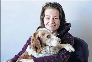  ?? SUBMITTED PHOTO ?? Jodi Vincent took part in the read-aloud program, a program run by the Elizabeth Fry Society of Saint John, N.B. Vincent keeps in touch with the society, and enjoys spending time with Henry, the “resident healing dog” at the office.