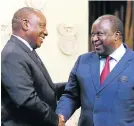  ?? Picture: ESA
ALEXANDER/
SUNDAYTIME­S ?? SHA-SHA: President Cyril Ramaphosa congratula­tes new finance minister Tito Mboweni at Tuynhuys in Cape Town