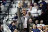  ?? AP FILE ?? Connecticu­t head coach Geno Auriemma gestures to team during the first half of recent American Athletic Conference tournament final.