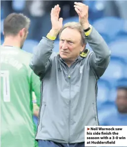 ??  ?? > Neil Warnock saw his side finish the season with a 3-0 win at Huddersfie­ld