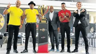  ?? Picture: BHONGO JACOB ?? UP FOR IT: From left, Shaun Bartlett, Kaizer Chiefs captain Willard Katsande, ex-England star Ian Wright, Pirates captain Happy Jele and Milutin Sredojevic at the launch of the Carling Black Label Cup in Johannesbu­rg.