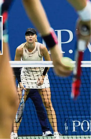  ?? — AFP ?? It pays to be her: Russia’s Maria Sharapova getting ready for a serve from Hungary’s Timea Babos in the second round. Sharapova won 6-7 (4-7), 6-4, 6-1. Inset: Carolina Wozniacki lost 6-2, 6-7 (5-7), 6-1 to Russia’s Ekaterina Makarova.