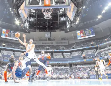  ??  ?? Bruno Caboclo #5 of the Memphis Grizzlies goes to the basket against the Oklahoma CityThunde­r at FedExForum in Memphis,Tennessee. - AFP photo