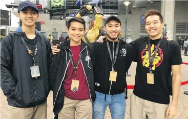  ?? NICK EAGLAND/PNG ?? From left, Matt Rodriguez, 17, and his brother Jordan Rodriguez, 14, with cousin Austin Liu, 21, and his brother Brandon Liu, 19, flew to Vancouver from Fresno, Calif., with four other family members to watch The Internatio­nal Dota 2 Championsh­ips.