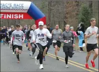  ?? The Sentinel-Record/File photo ?? RUN/WALK: Runners and walkers start the seventh annual Van Davis Memorial 5K Run/Walk and Kids Fun Run on Feb. 17, 2019, at Baseball Trail Park on Whittingto­n Avenue.