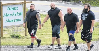  ?? DAVID JALA/CAPE BRETON POST ?? Four of the world’s strongest men arrive at the Giant MacAskill Museum in Englishtow­n to challenge the Herculean feats of strength attributed to the legendary giant who is said to have stood 7-foot-nine. The quartet was brought to Cape Breton as part...