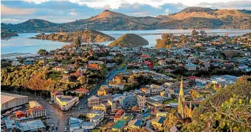  ?? DUNEDINNZ ?? Port Chalmers is a 20-minute drive from the Dunedin’s Octagon.